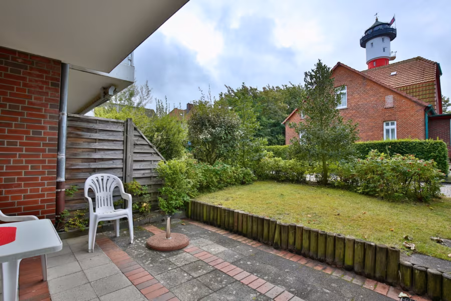 Wohnen am Wahrzeichen von Wangerooge: Erdgeschosswohnung mit sep. Schlafzimmer - Süd-Terrasse (42192)