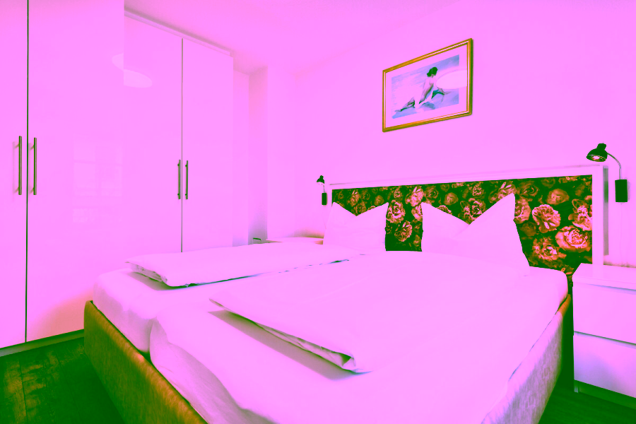 Exlusives Appartement- und Geschäftshaus im Herzen von Westerland auf Sylt - Schlafzimmer A1 (11203)