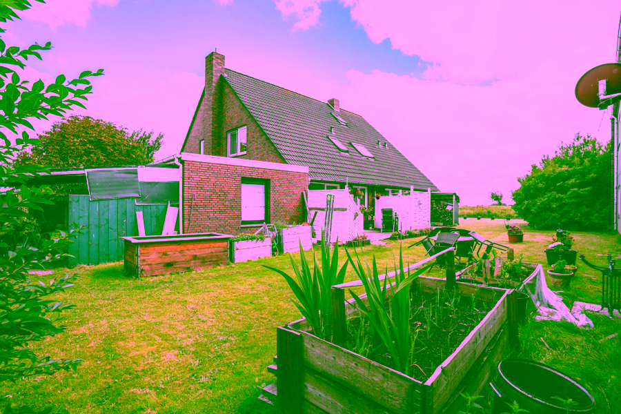 Attraktives Mehrfamilienhaus mit vielseitigen Nutzungsmöglichkeiten - Außenansicht (12080)