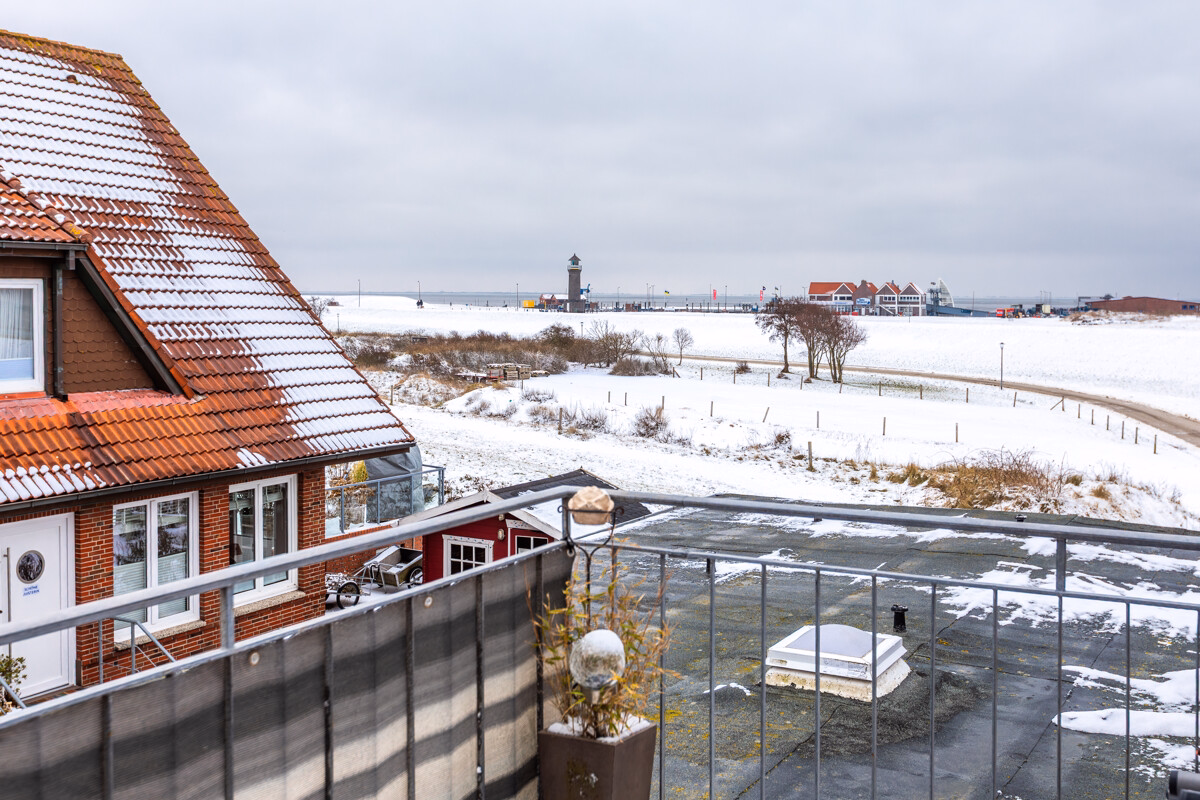 Komfortable Ferienwohnung mit Balkon und imposantem Blick auf Wattenmeer und Hafen